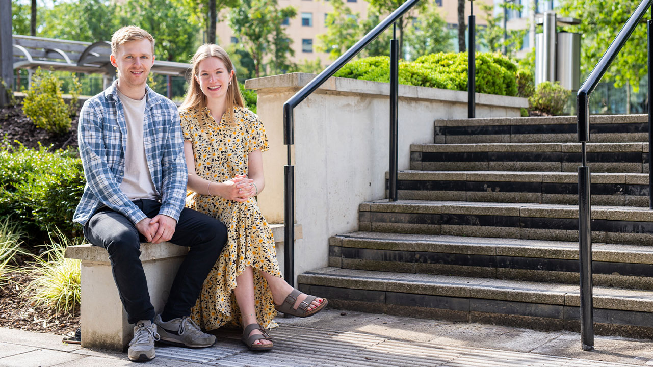 Andy & Grace sitting outside of Nexus, Leeds